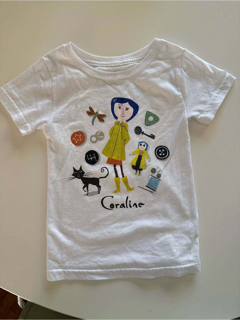 Coraline Graphic White Kids Tee with Yellow Details